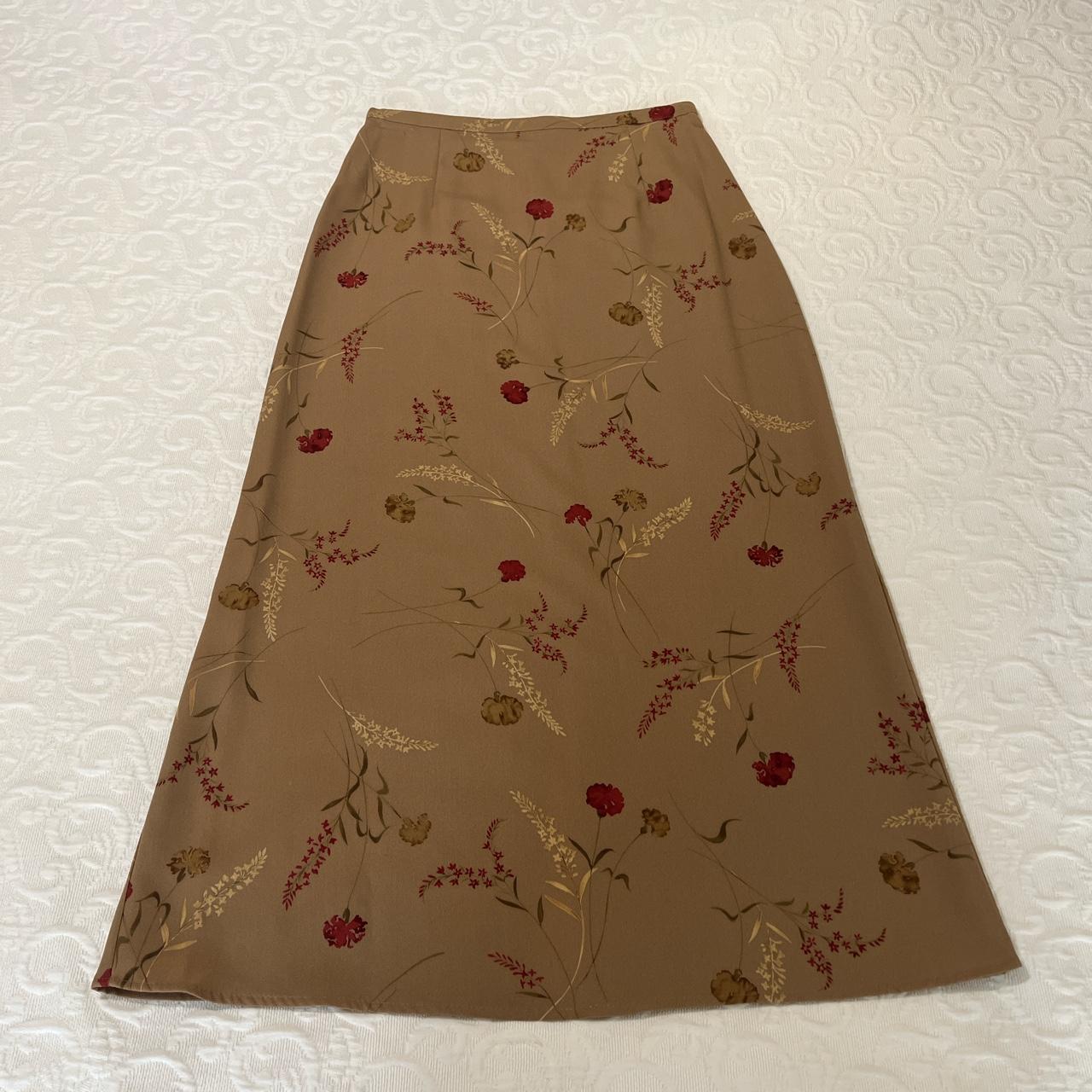 Light brown skirt with flower designs! Slit on the ... - Depop