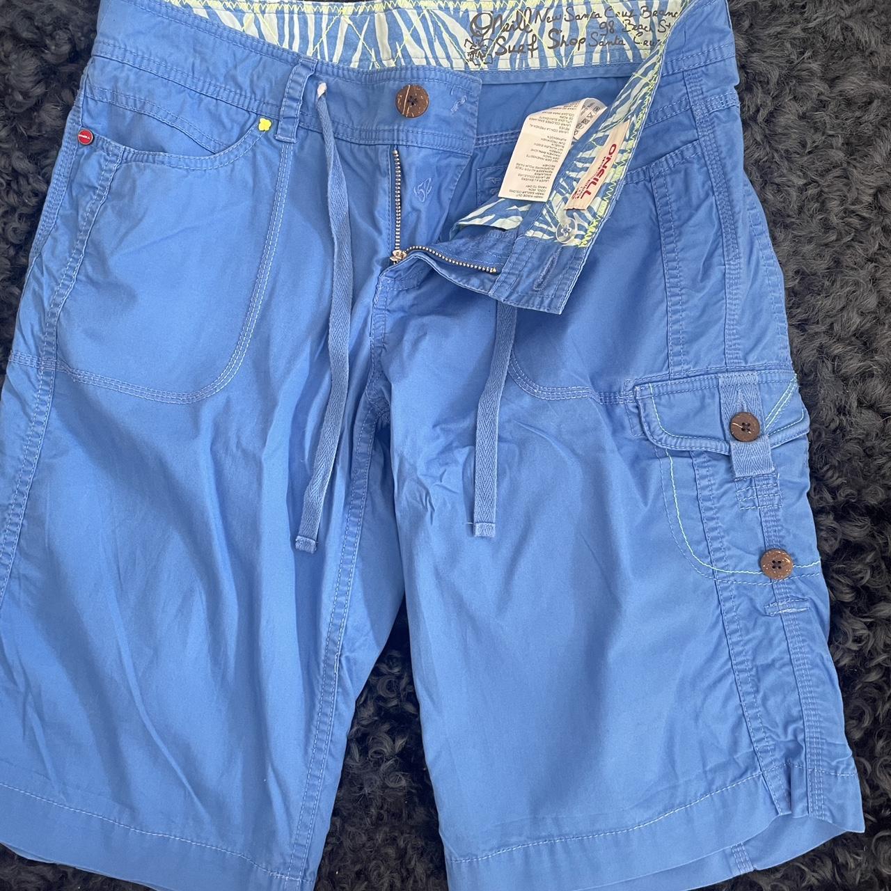 bright blue o neil cargo shorts with some cool teal... - Depop