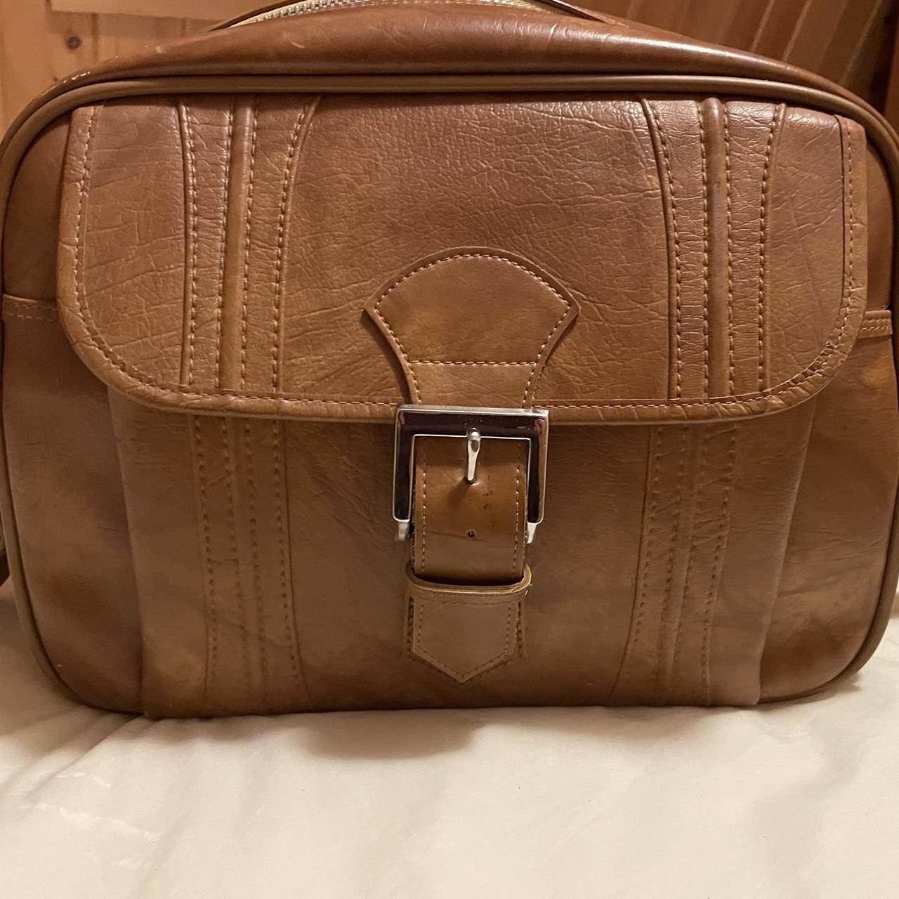 American tourister leather discount bag