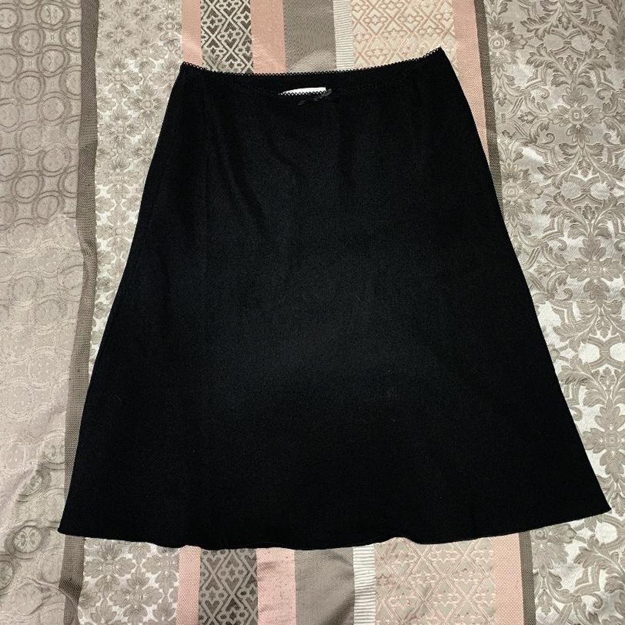 Danielle Guizio Women's Black Skirt | Depop