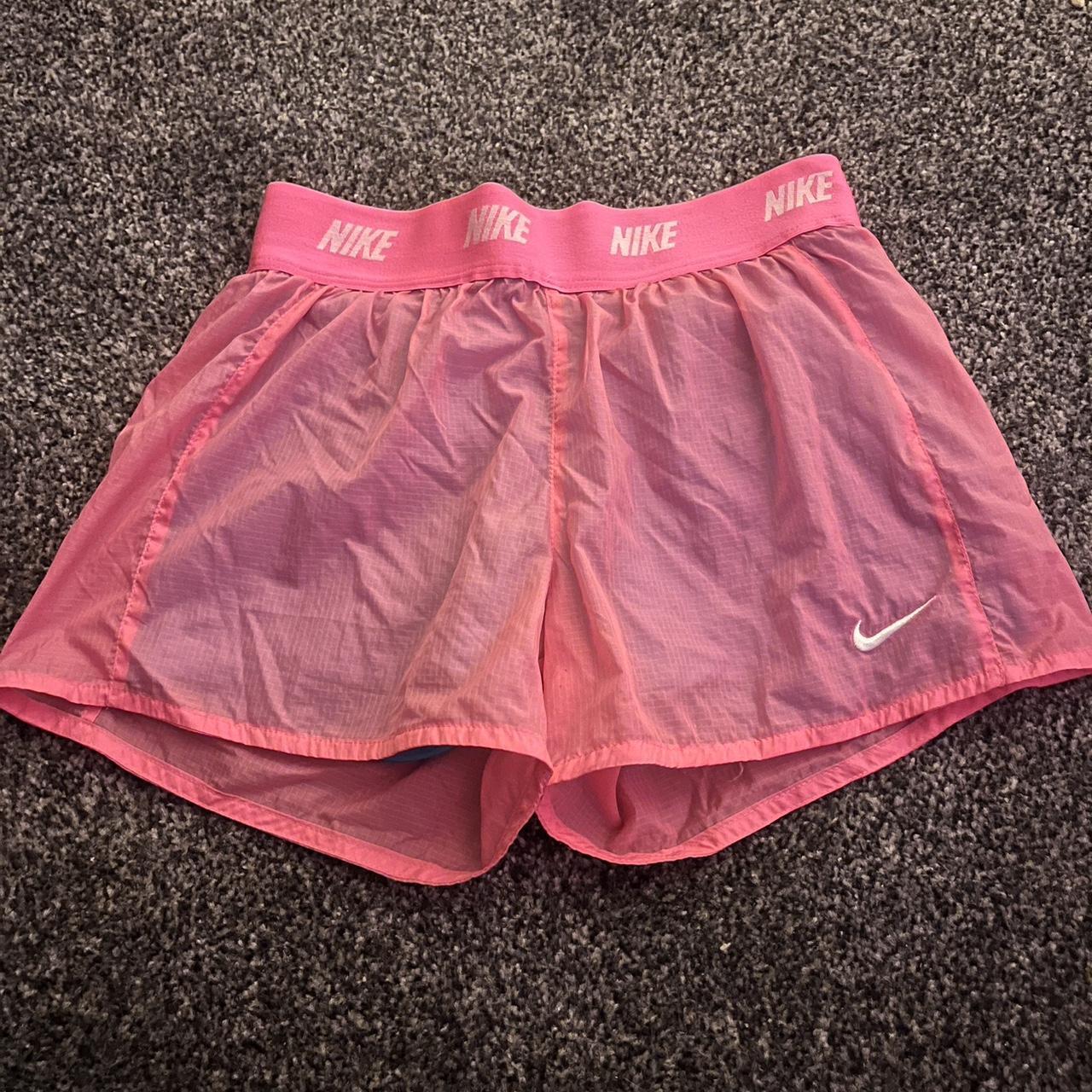 Nike kids running shorts. Neon pink and blue.... Depop