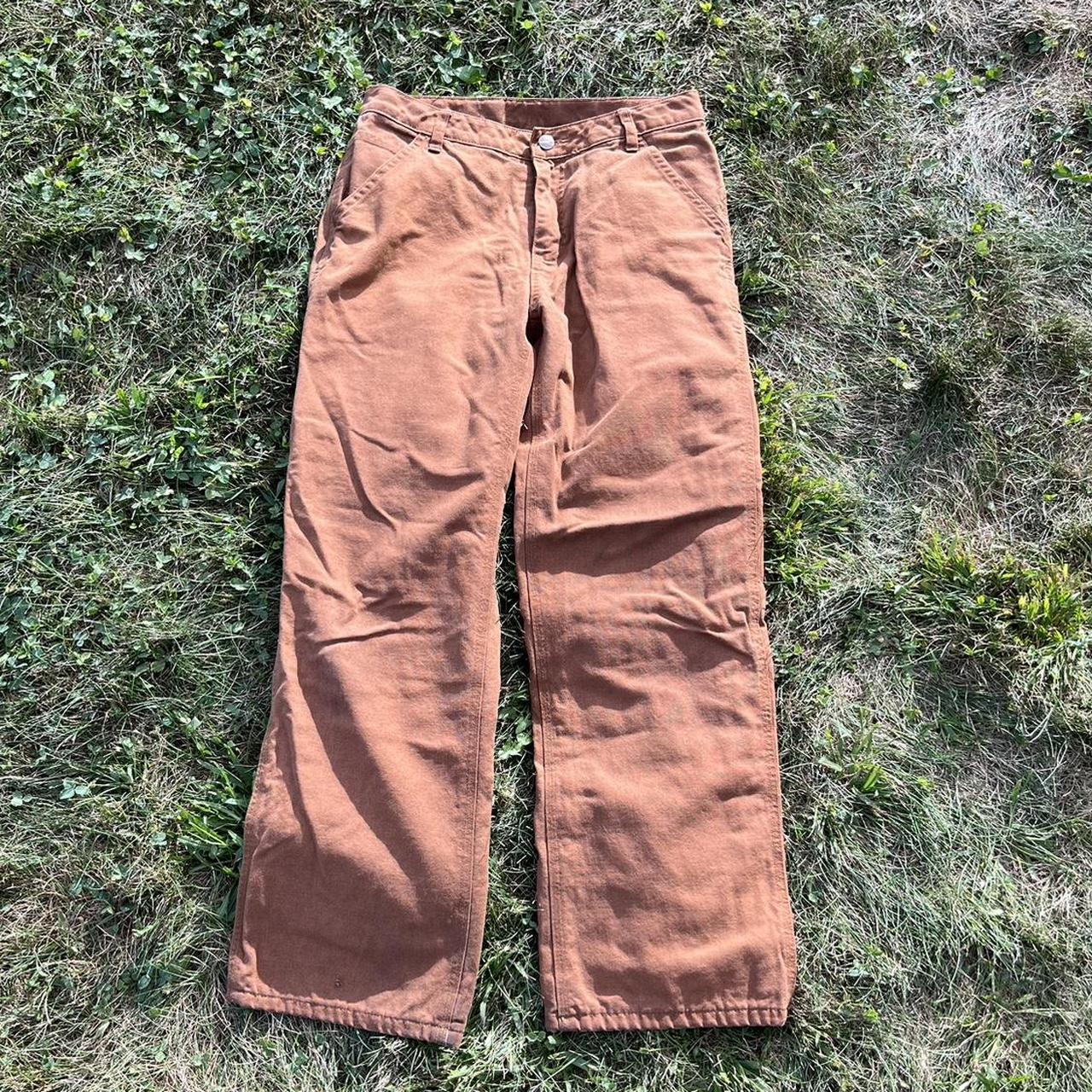 Women's Carhartt flannel lined cargo pants size 14.... Depop