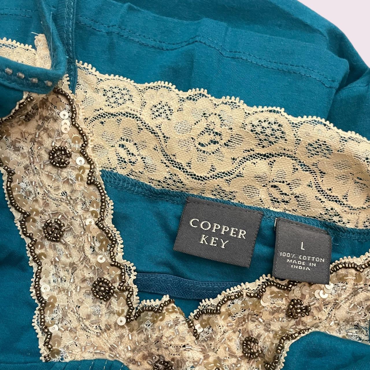 Copper Key Women's Blue and Cream Vest Depop