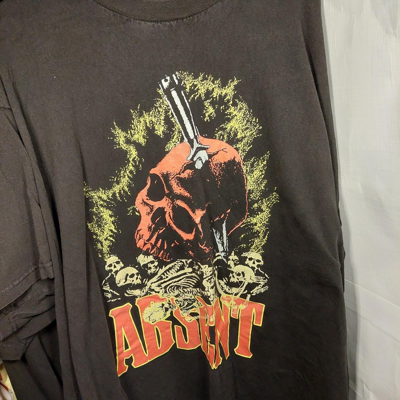 Half Evil Absent Tee -Cracking on back screen... - Depop