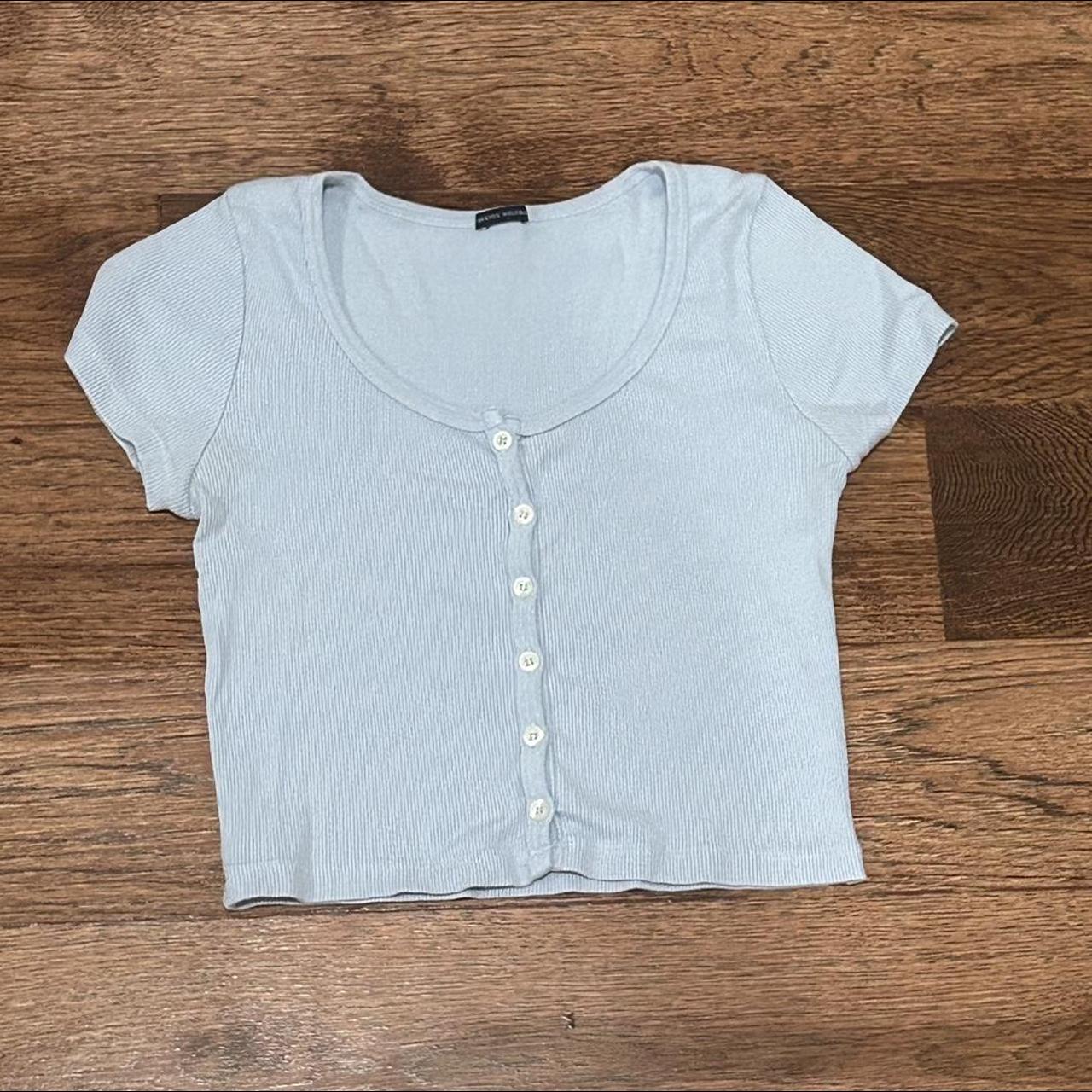 brandy melville light blue zelly top. lightly worn,... Depop