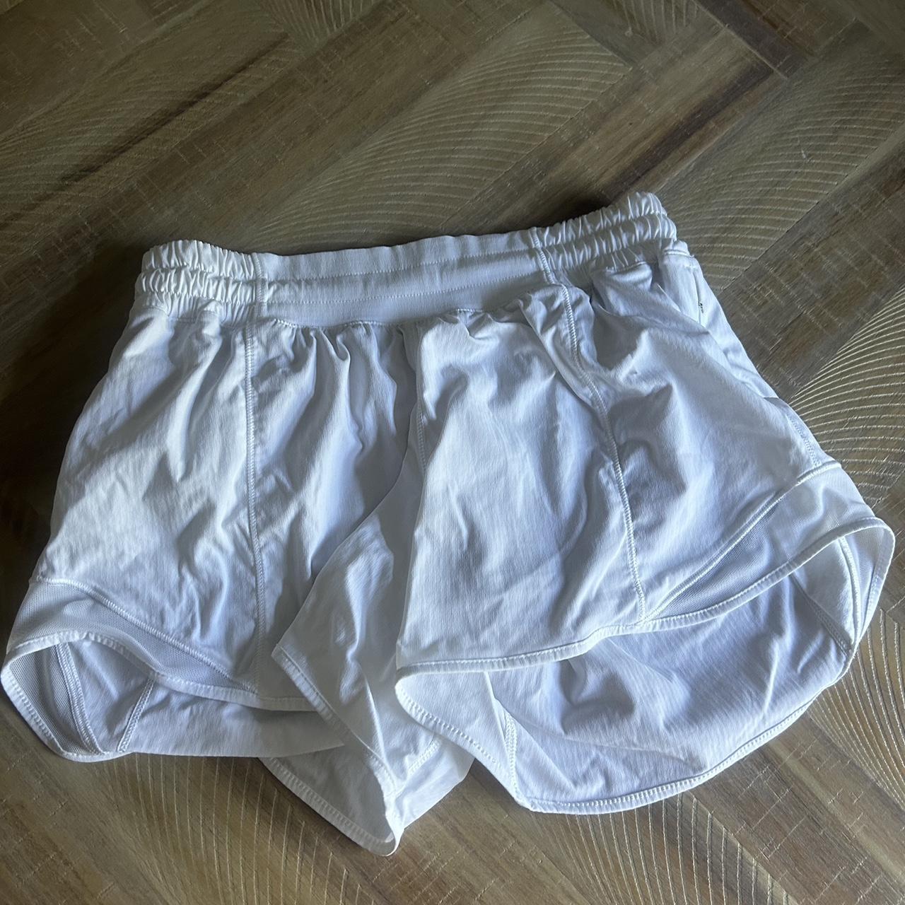 white hotty hot shorts!! I believe that they are 2.5... - Depop