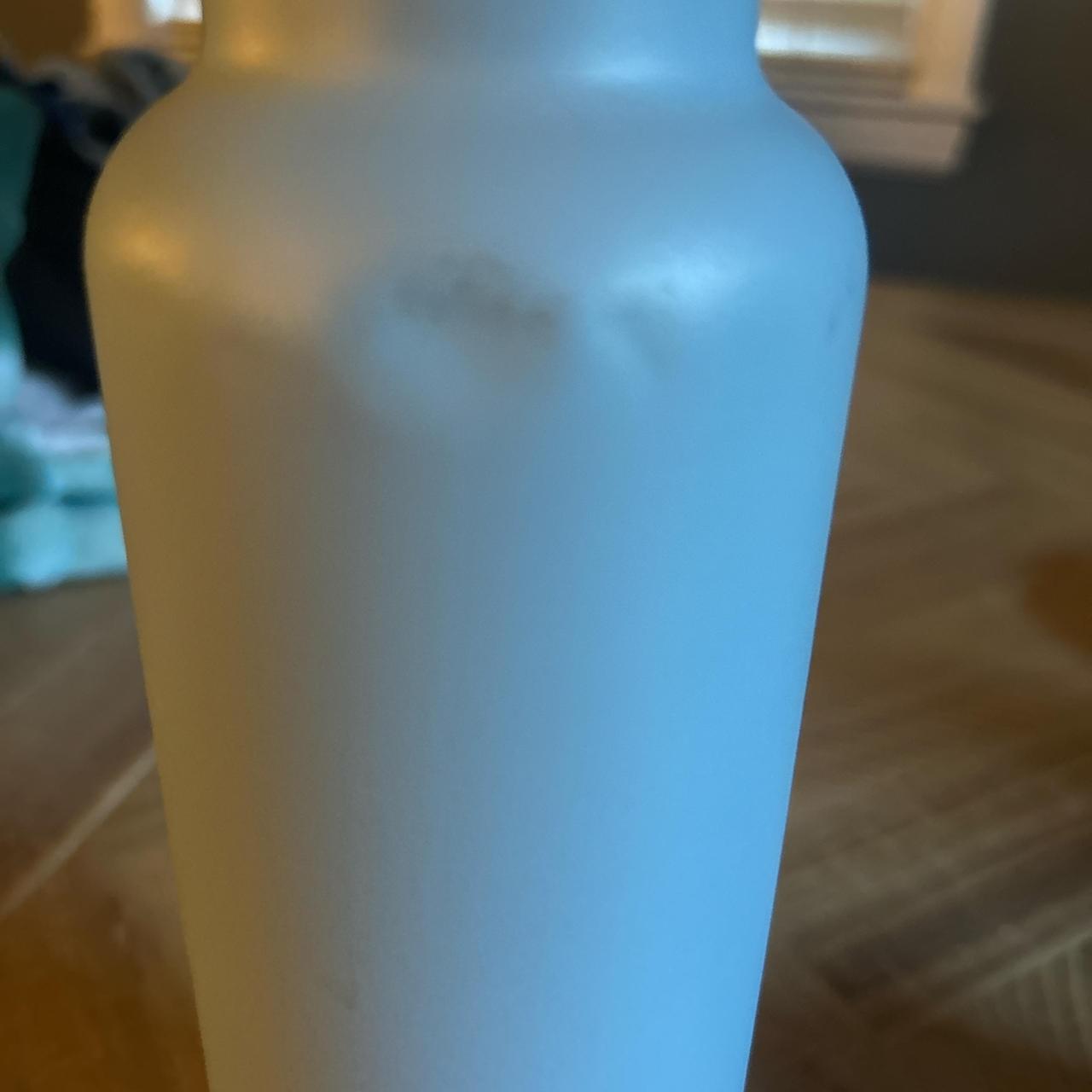 light blue hydro flask with bottom! 💙, - a few dents...