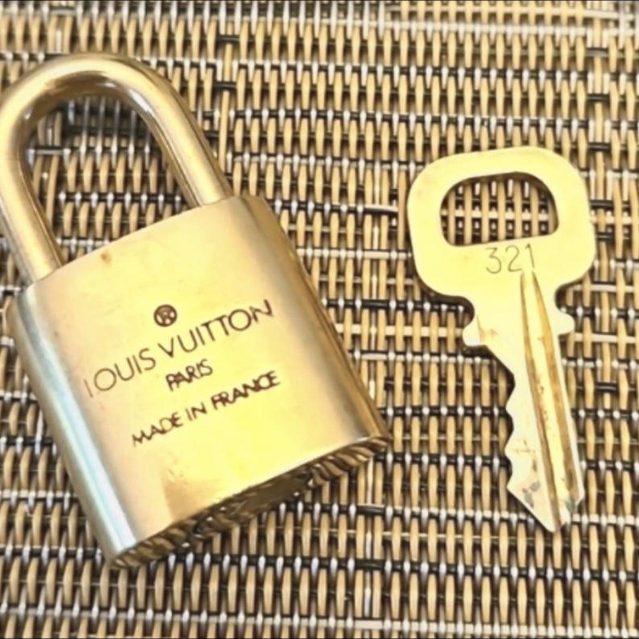 Silver Louis Vuitton Lock & Key •Silver (Palladium) - Depop