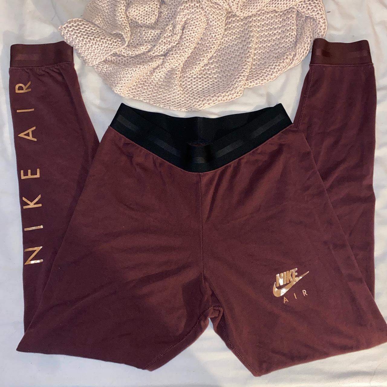 Shiny maroon nike leggings size small - Depop