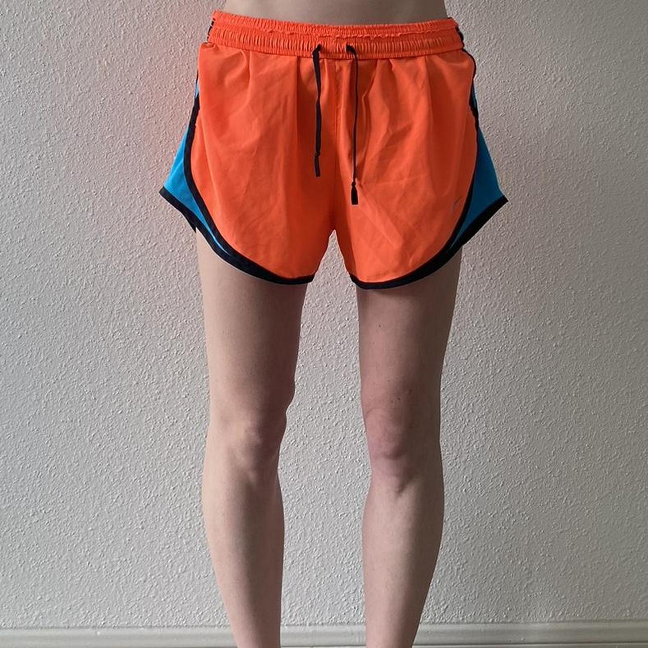 neon orange nike shorts womens