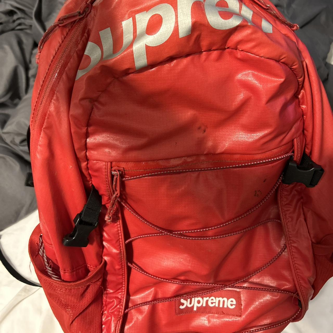 Fake red supreme clearance backpack