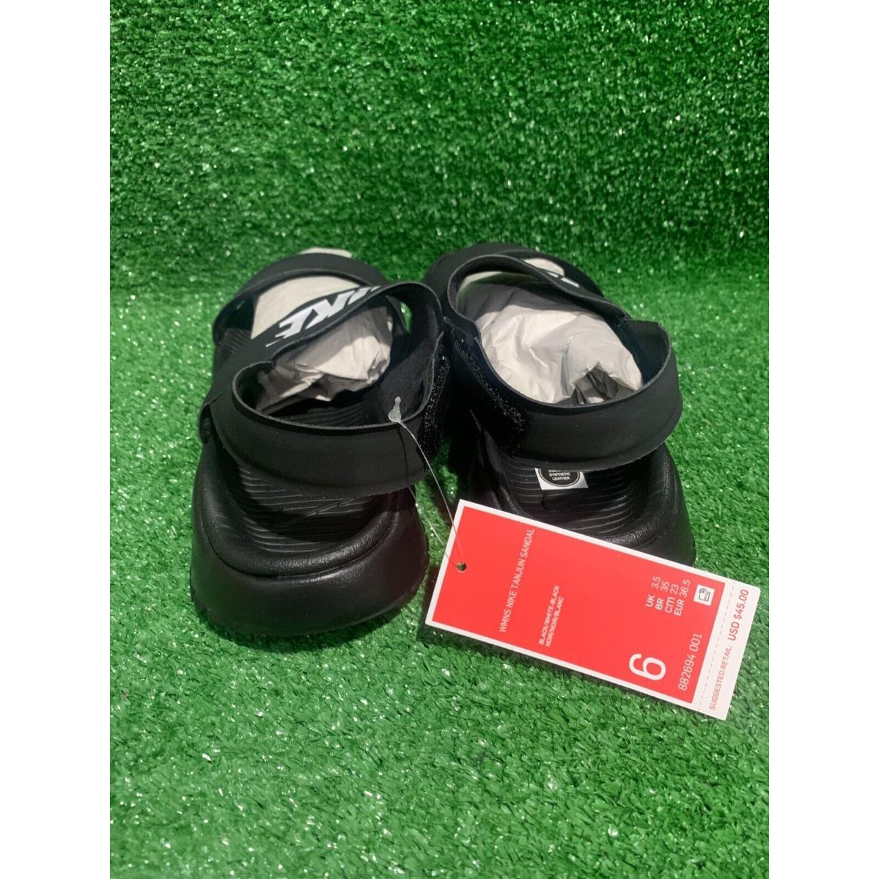 Black sales tanjun sandals