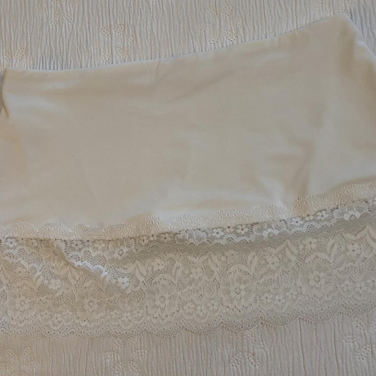 white mini skirt shape wear with lace. marked size... - Depop