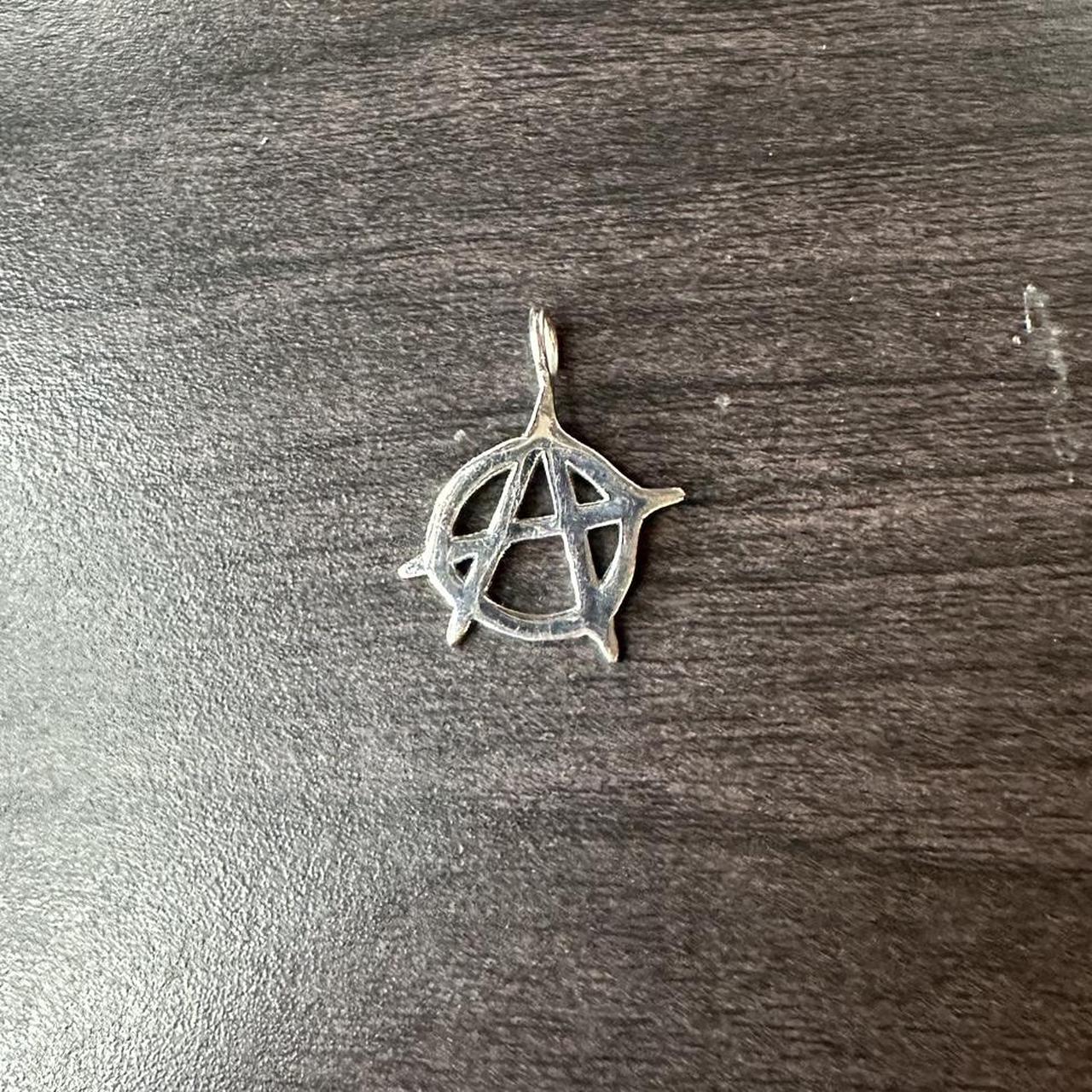 hard jewlery anarchy pendant - Depop