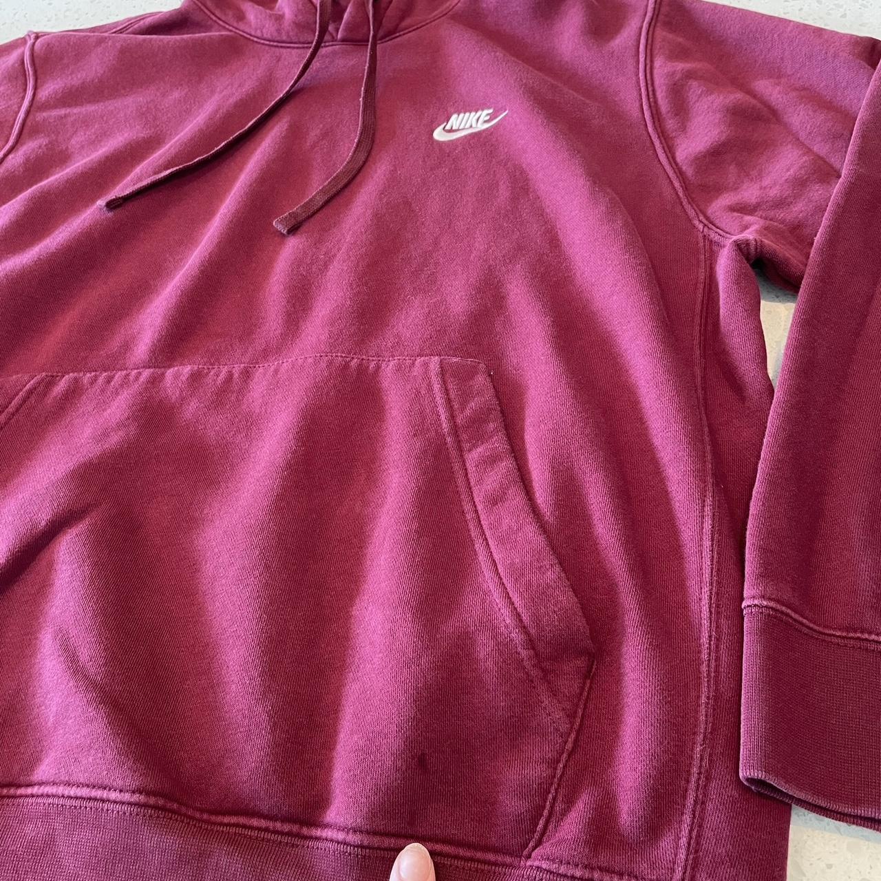 Maroon Nike hoodie Tiniest little mark at bottom as... - Depop