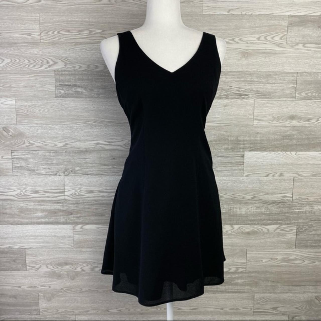 Nicole Miller Women's Black Dress | Depop