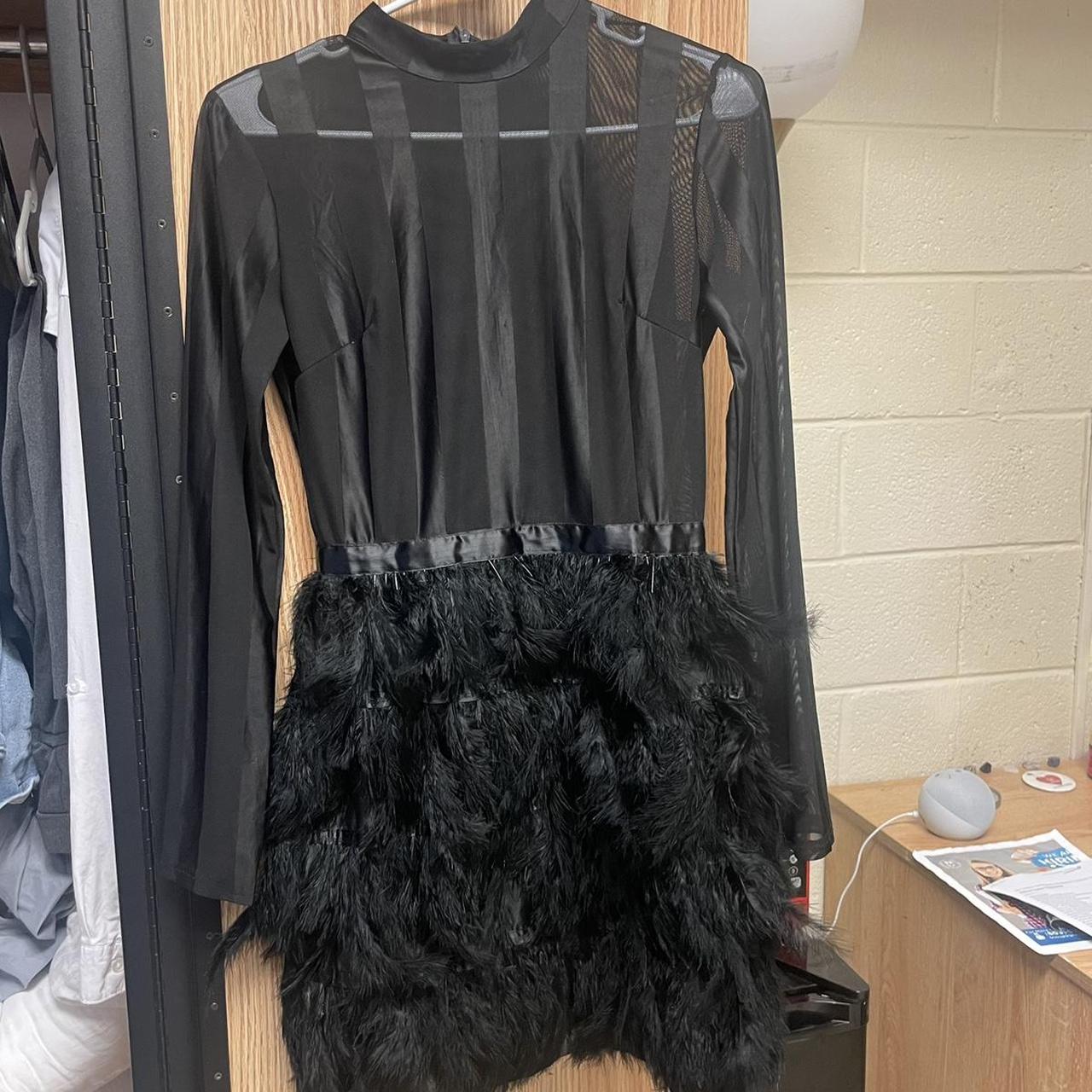 Black feather dress from PLT Top portion is