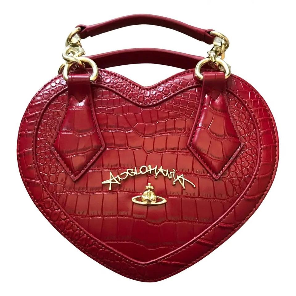 Vivienne Westwood Heart Bags! ❤️💚💗🖤 Slide 2,5,6,7,8 & 10 are the Chancery  Heart Bag Slide 3,4 & 9 are the Dorset Heart Bag Collage made…