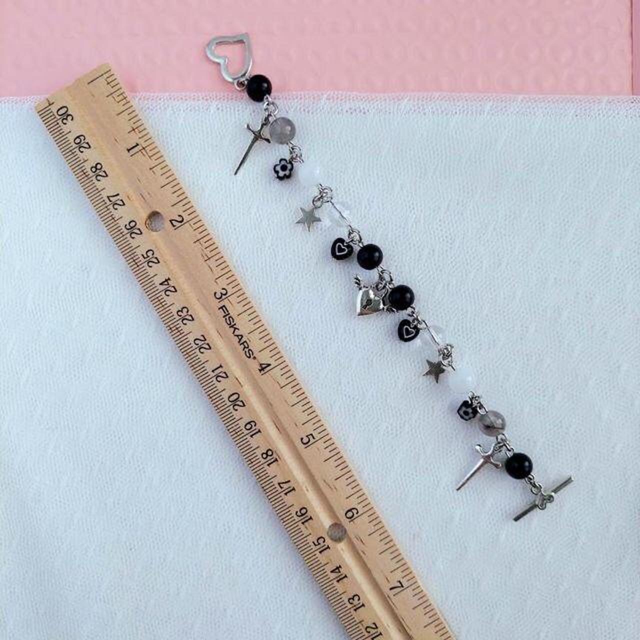 Pretty grunge charm bracelet! Has Black, Clear,... Depop