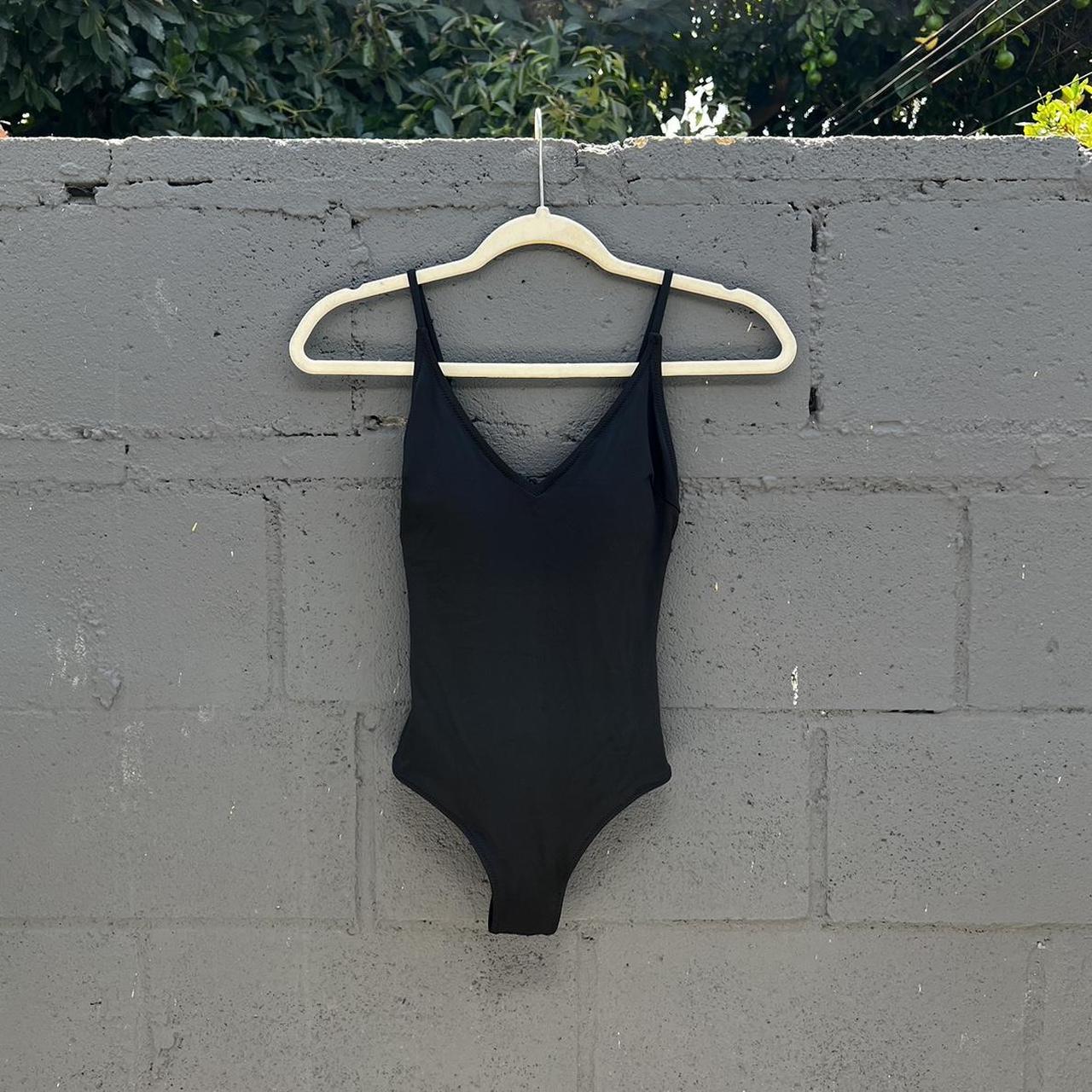 Forever 21 plain black one piece swimsuit. Size small. Depop