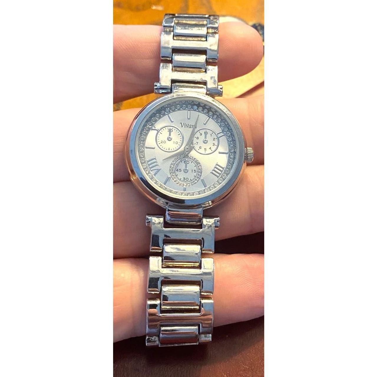 Vivani | Accessories | Vivani Womens Watch Two Tone Face With Opalescent  Back Round Wac5347kl 48 | Poshmark