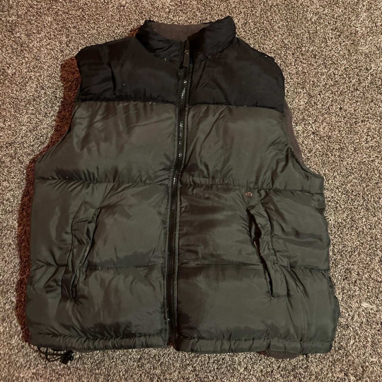 old navy puffer vest tagged xl small burn mark above... - Depop