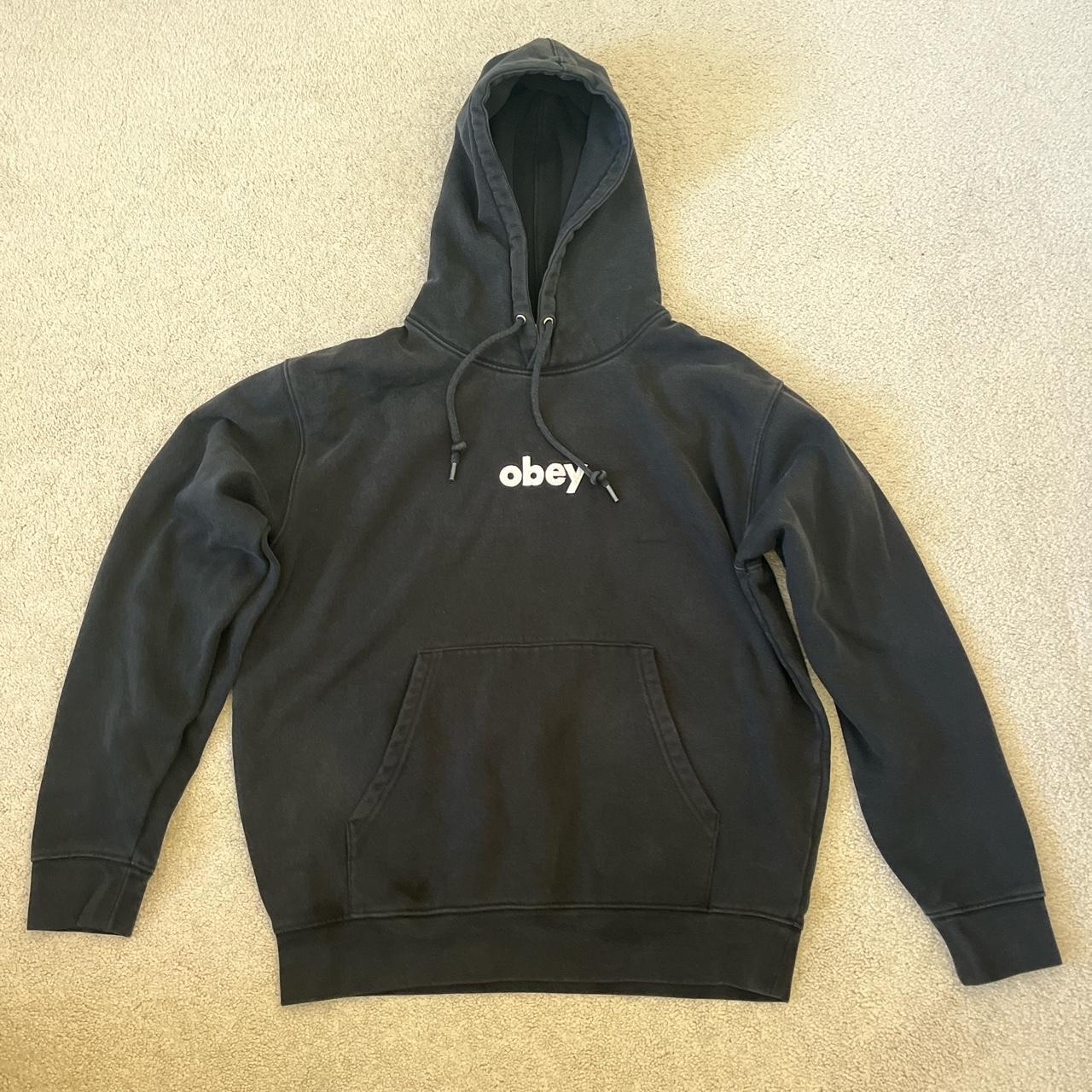 Small Black Obey Hoodie. Has a washed black fade Depop