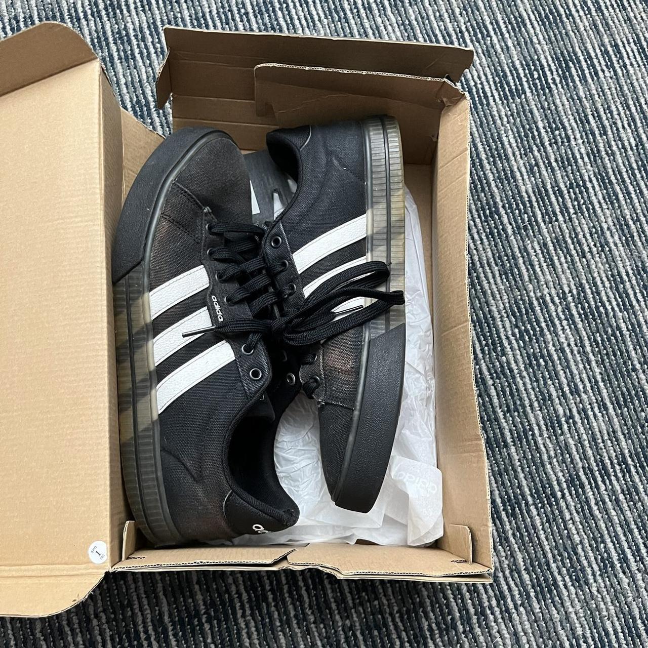 triple black adidas shoes