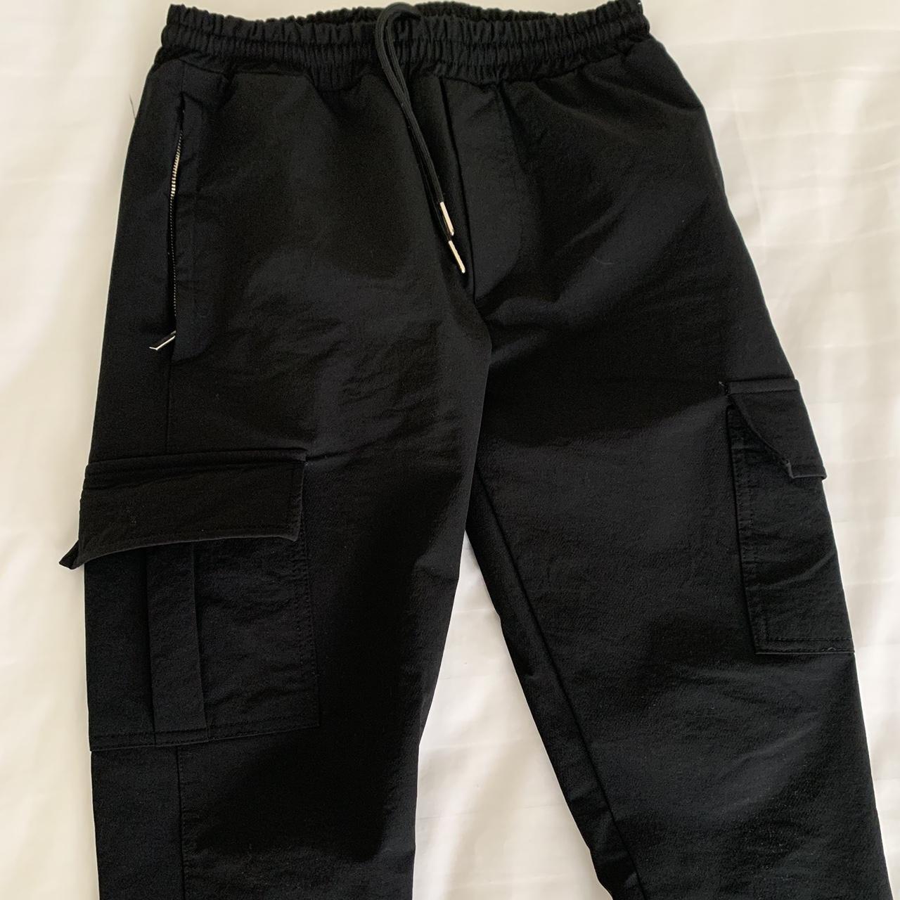 Men’s Arne black cargo pants. Size Small. Used... Depop