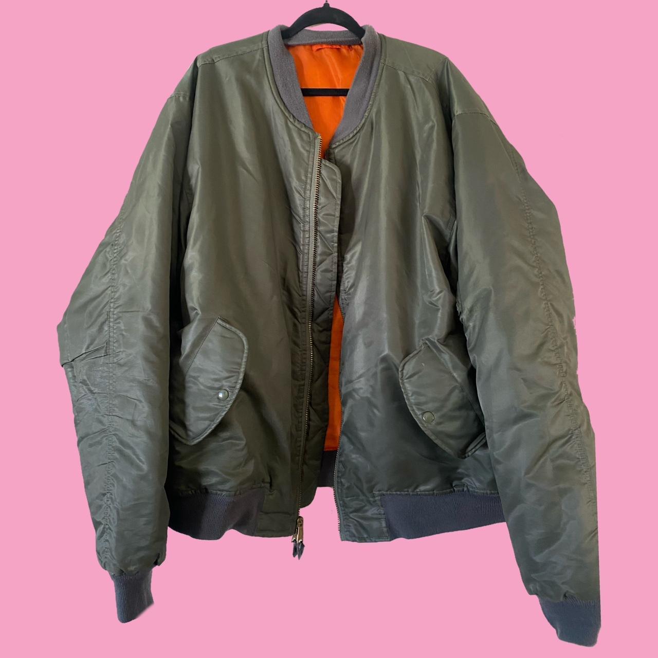 Green bomber outlet with orange lining