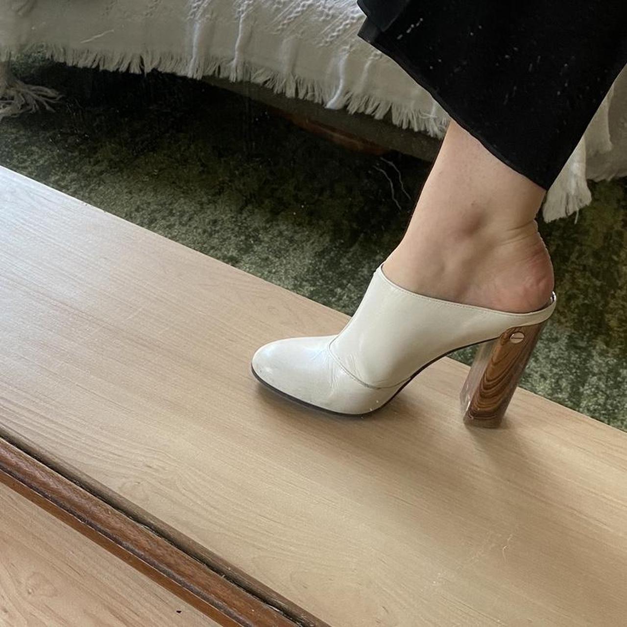 Super cool 4 inch heel mules. White leather with... Depop