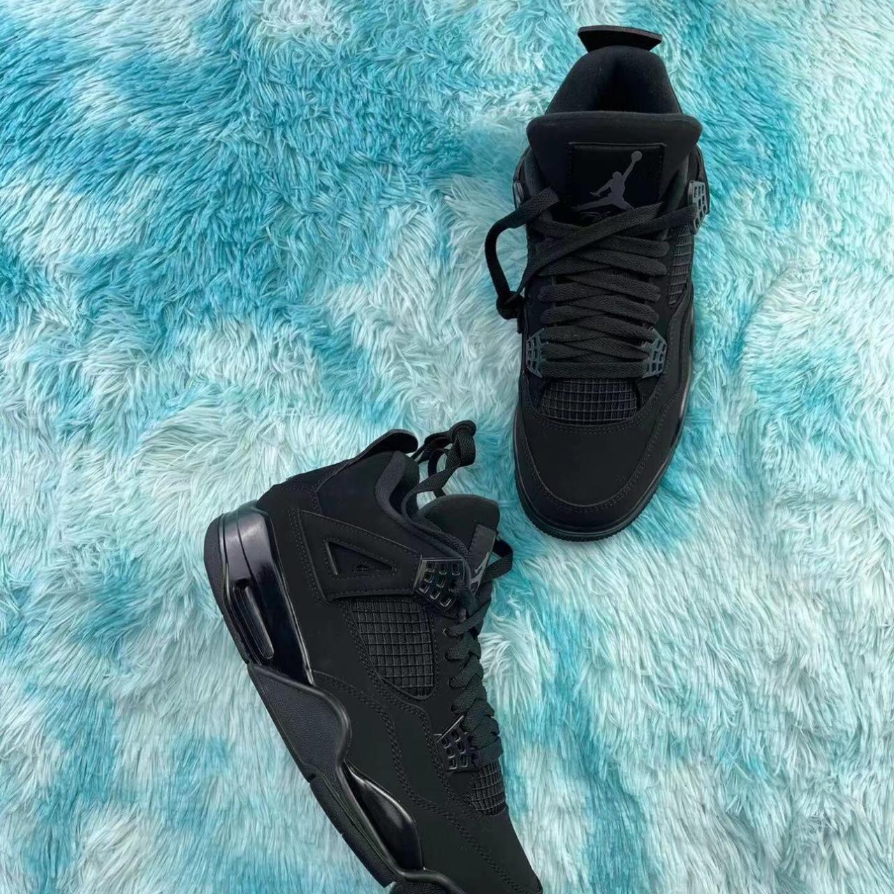mens black cat 4s