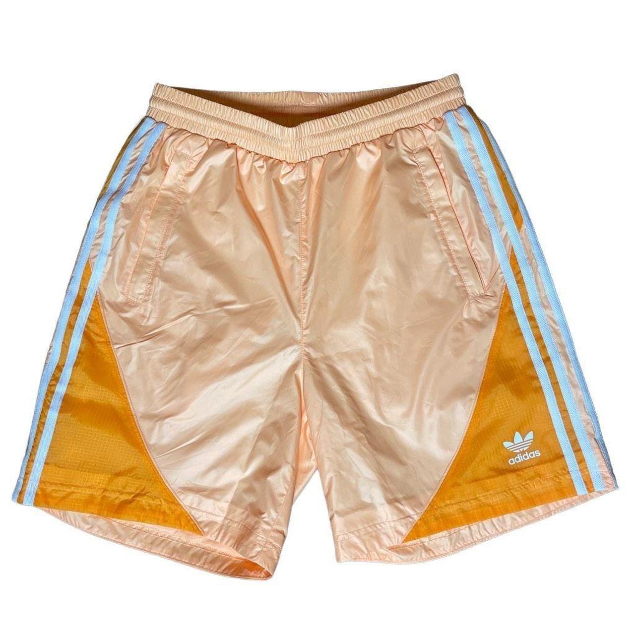 awesome adidas original short in a unique peach.... Depop