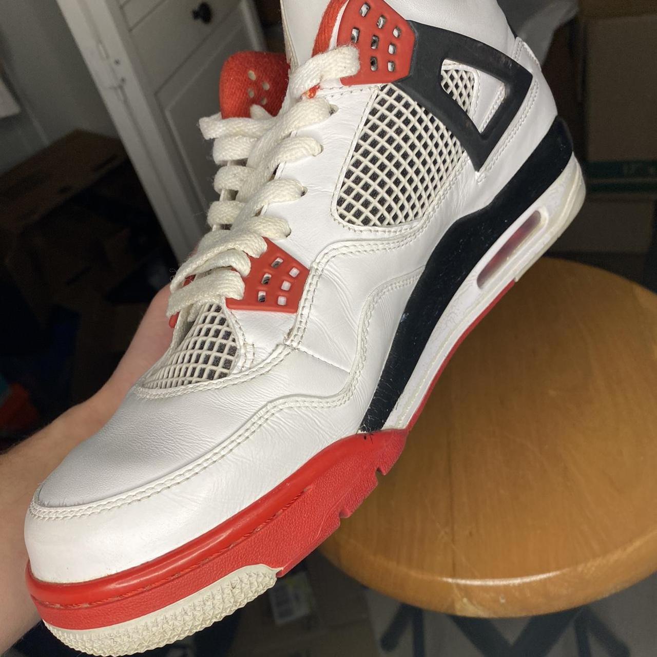 Air Jordan 4 fire red 2012 Lightly aged near... - Depop