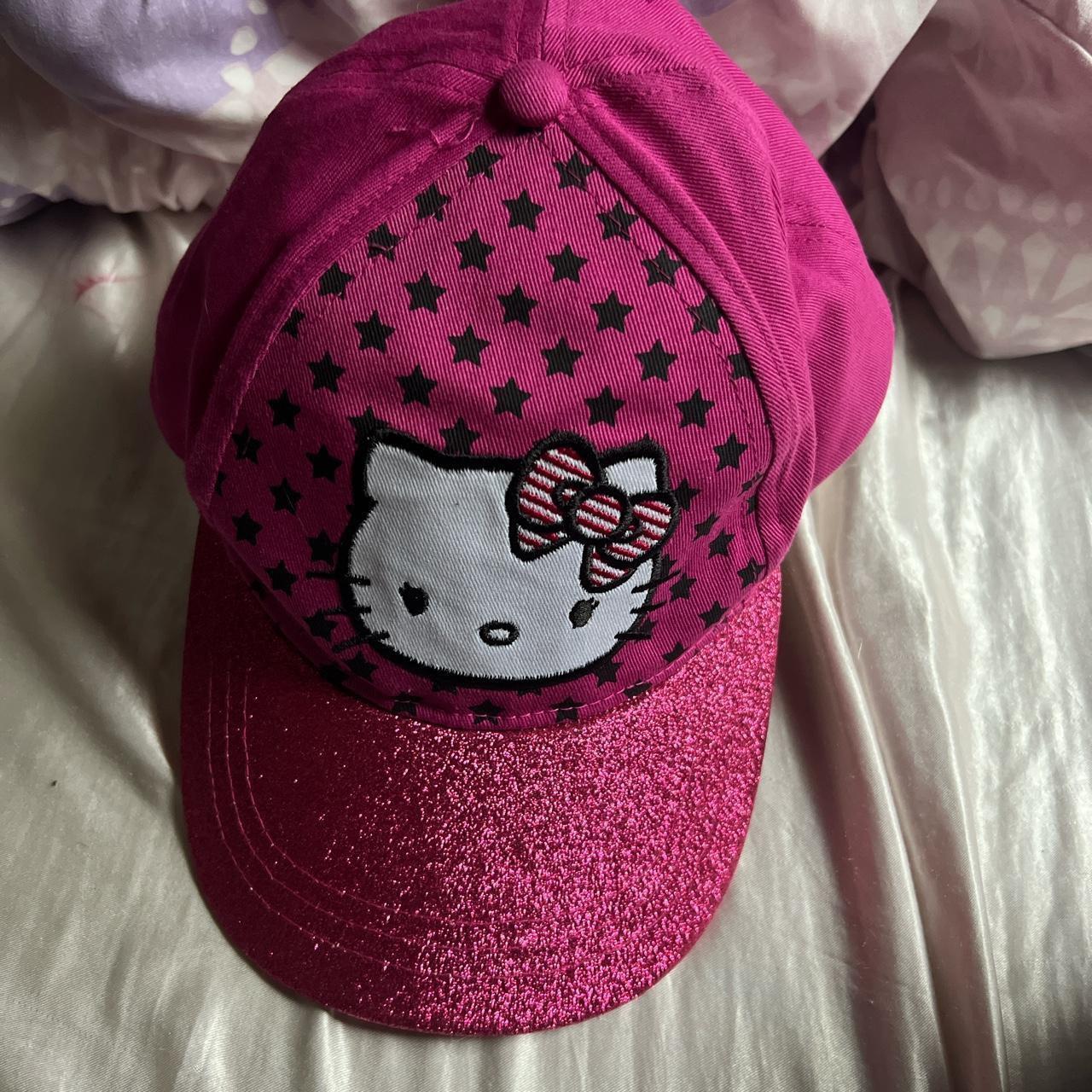 hello kitty wearing hat