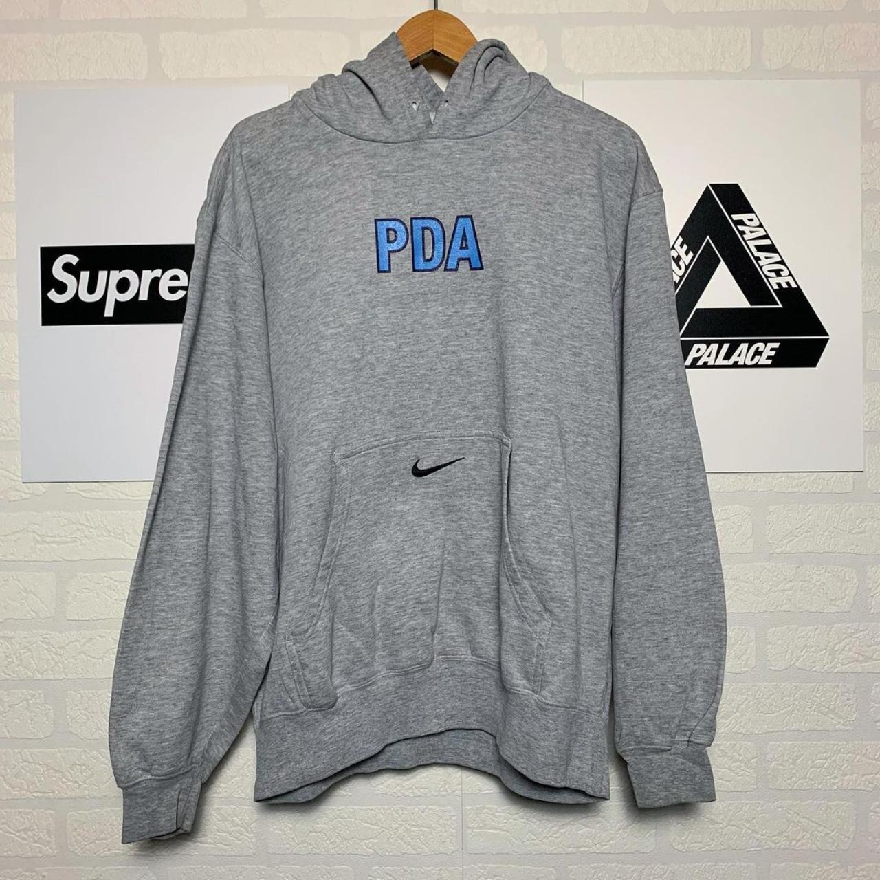 Nike hoodie central clearance logo