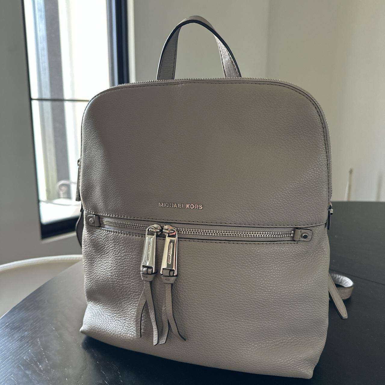 Brand new Michael Kors Pearl grey MD slim backpack.... - Depop