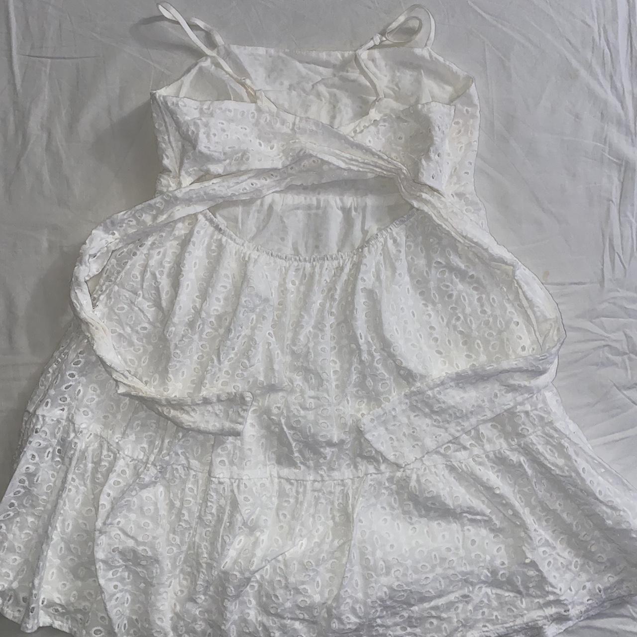 white eyelet mini dress. flows perfectly out. has a... - Depop
