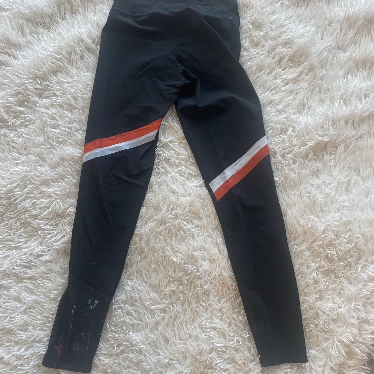 Sweaty Betty Women's Black and Orange Leggings | Depop