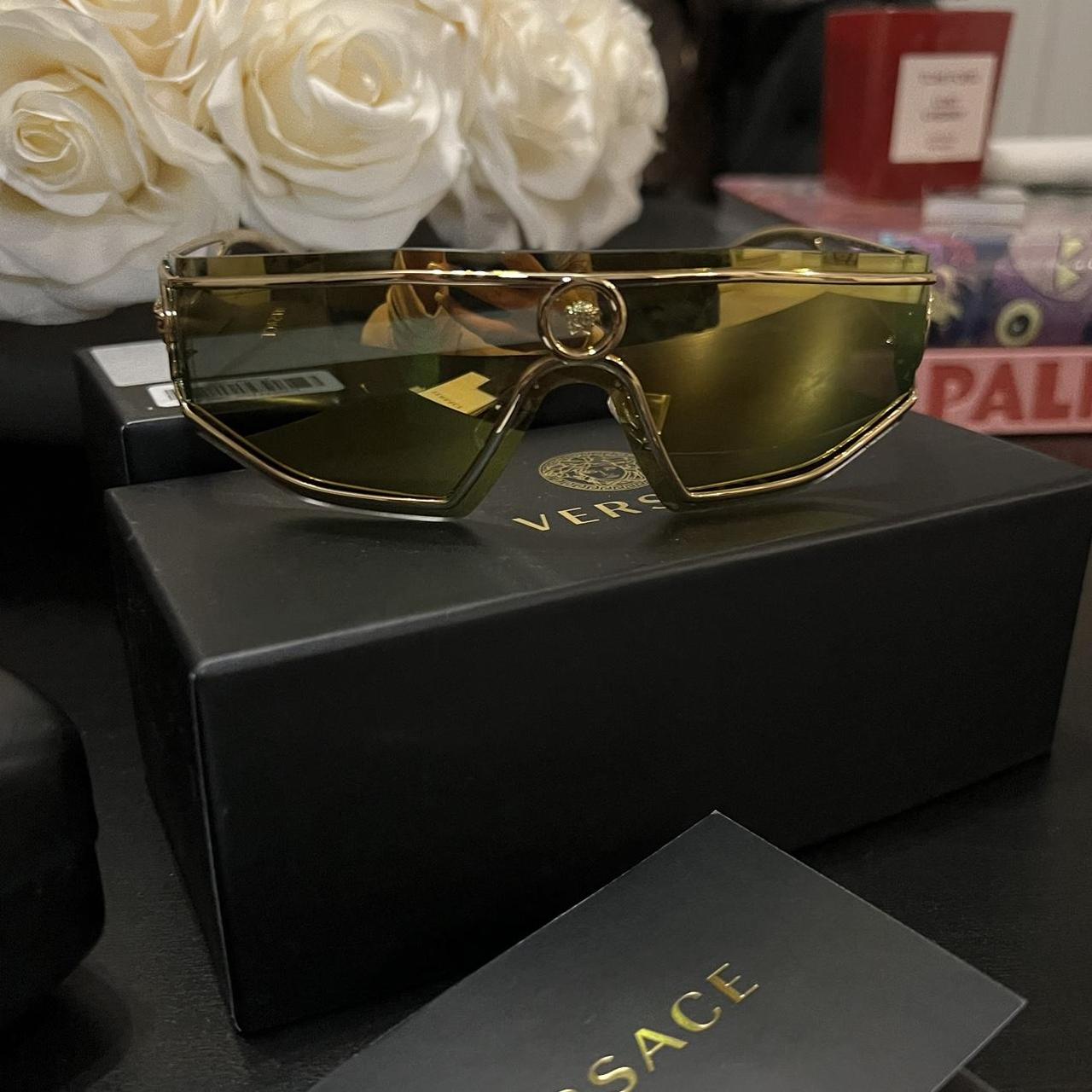 Genuine gold wrap around Versace sunglasses paid... Depop