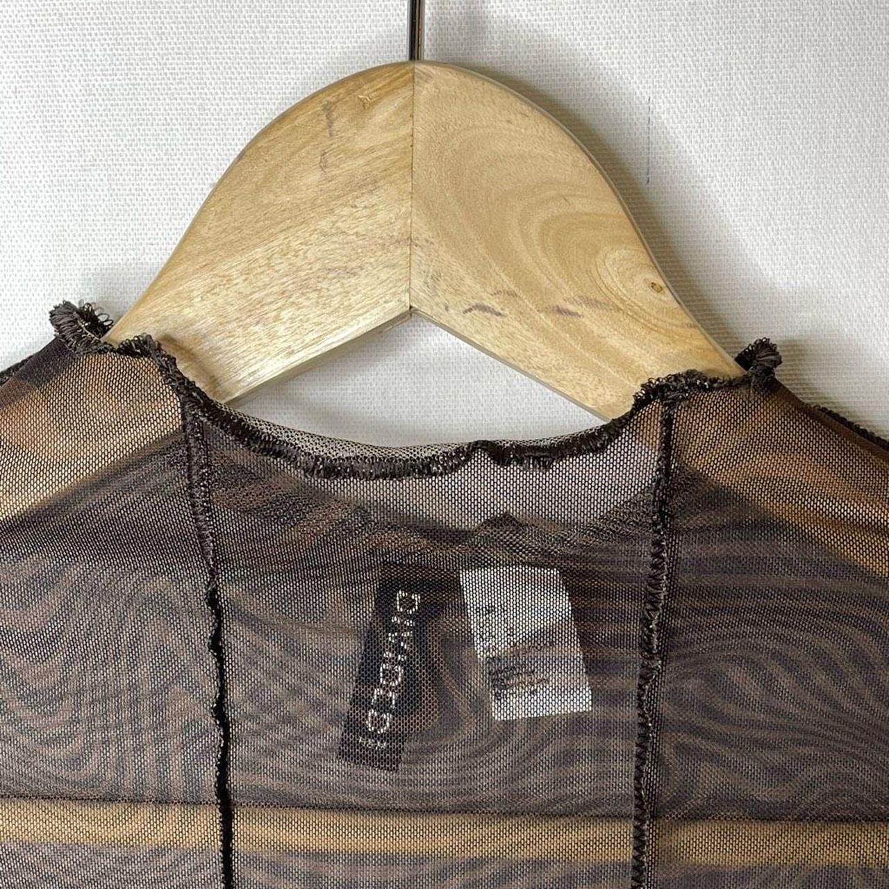 Sheer brown mesh with lettuce hem Visible seams Mock... - Depop