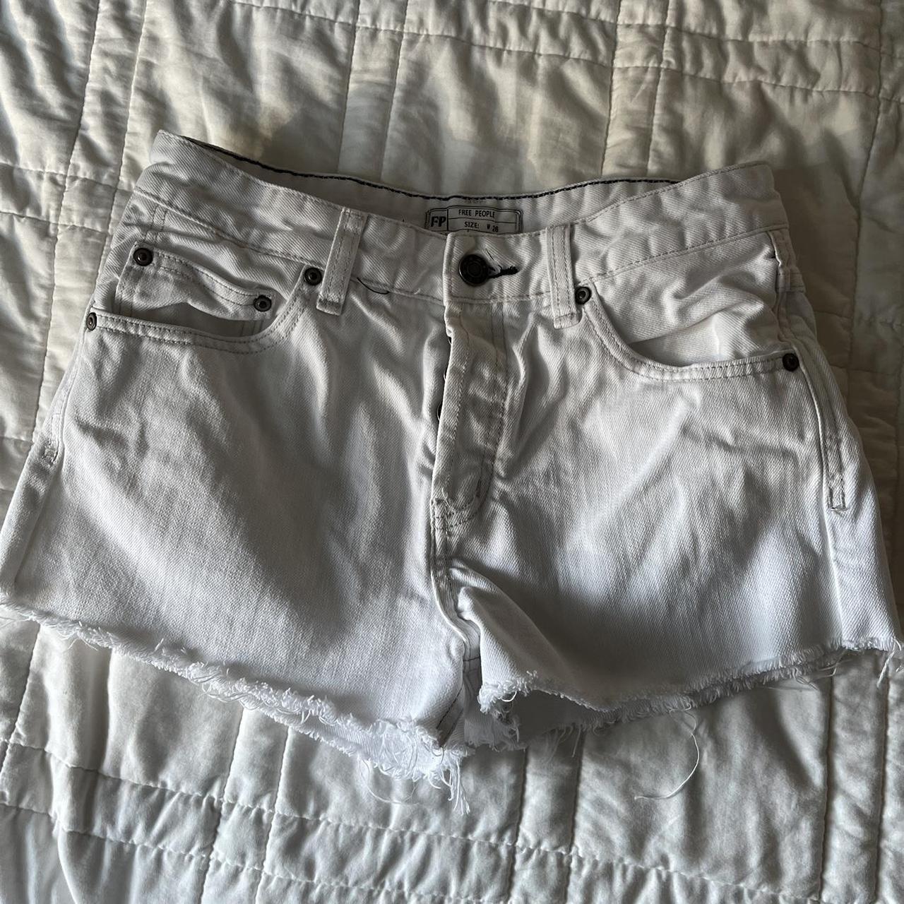 White jean shorts by Free People. Great... Depop