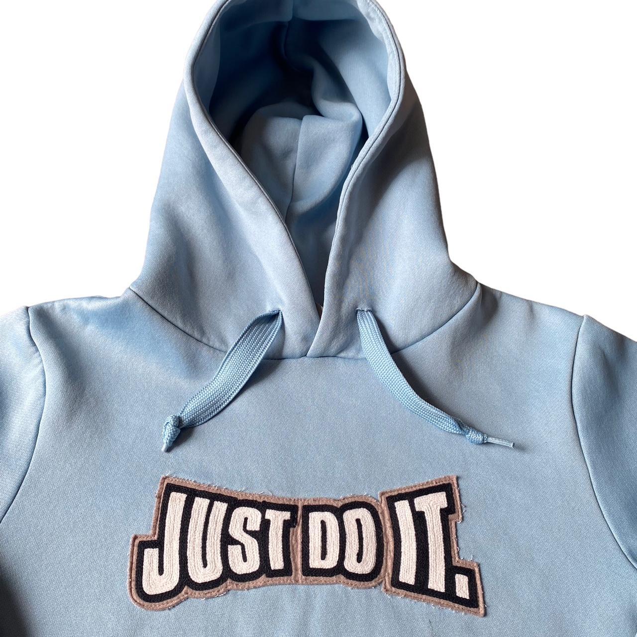 Vintage light blue Nike hoodie with a large Just do... - Depop