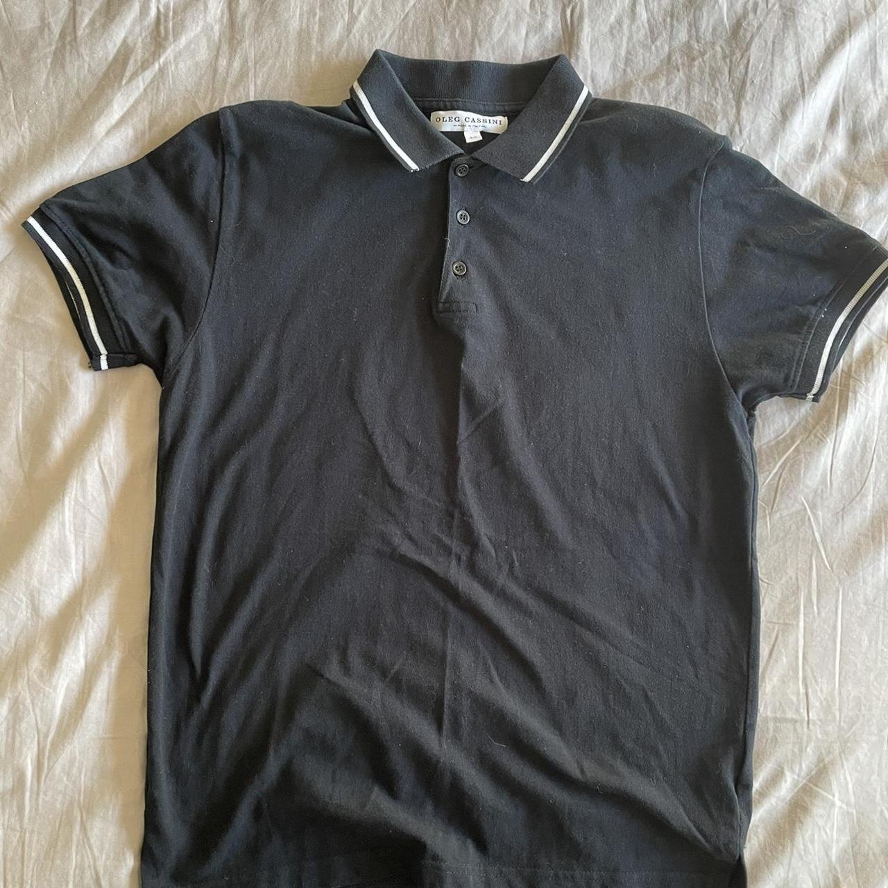 Black Oleg Cassini polo shirt with white accent... - Depop