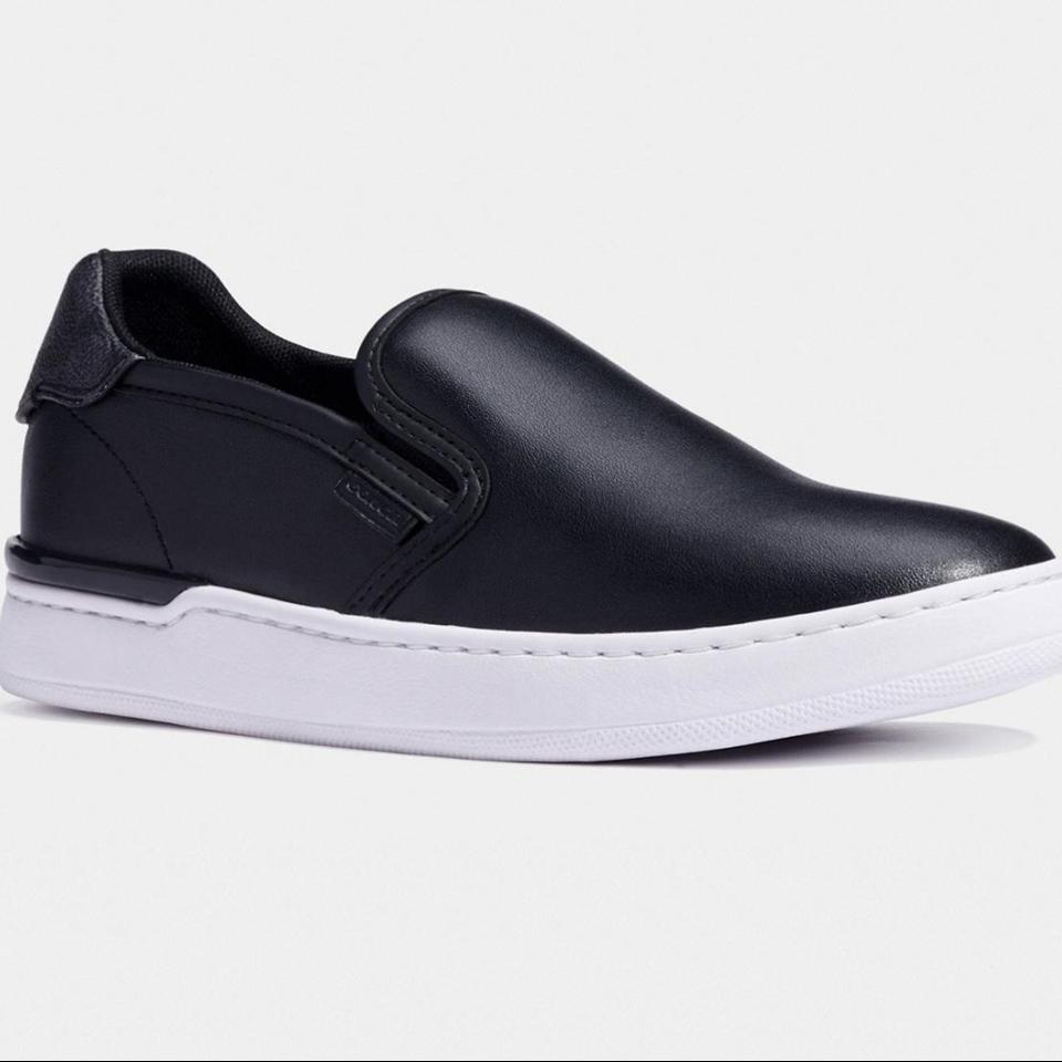 Coach black store slip on shoes