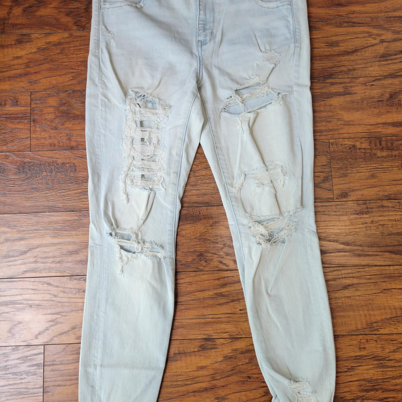 AMERICAN EAGLE Bleached Blue Ripped Legs Depop