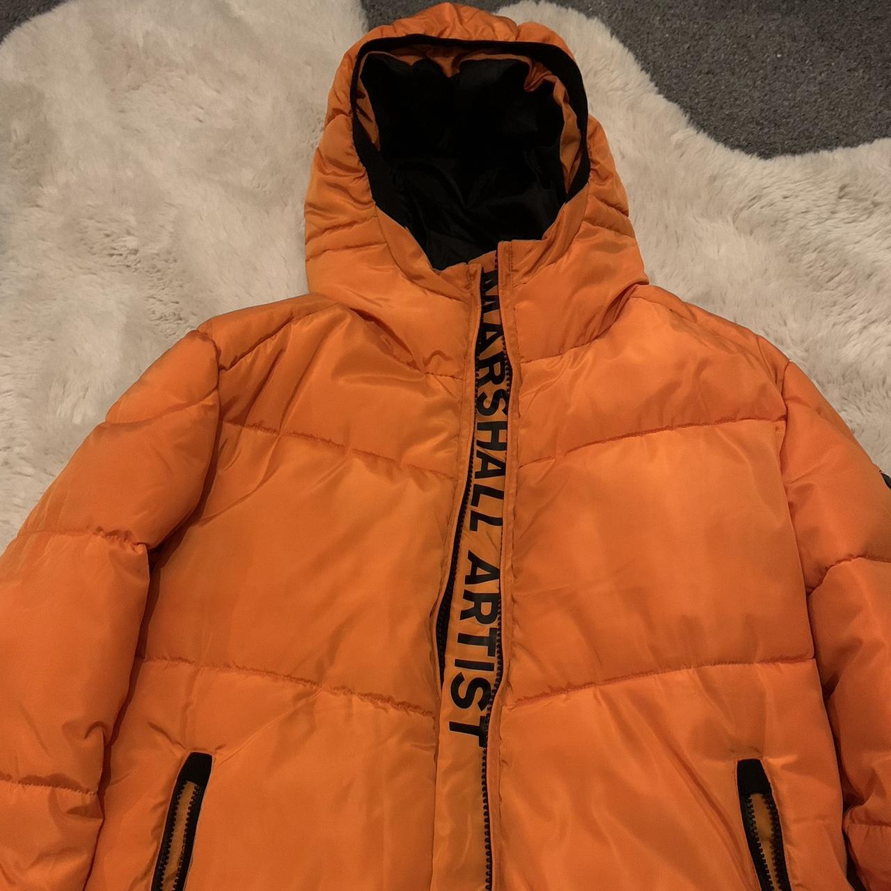 Marshall artist 2024 orange jacket