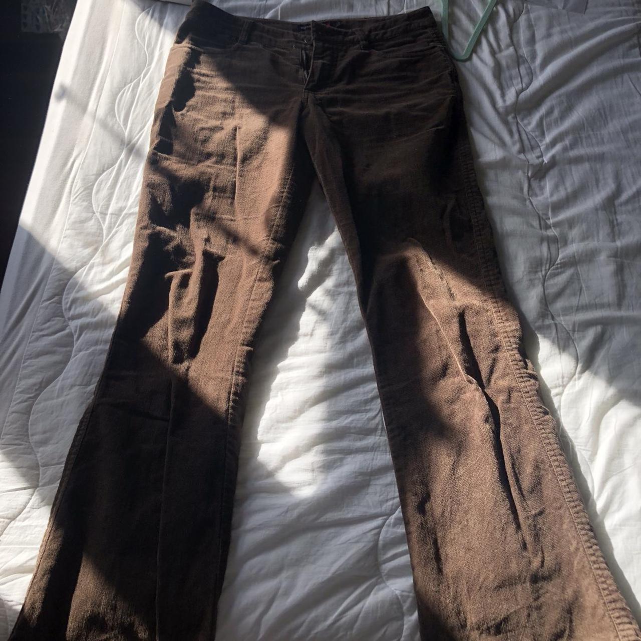 Low rise brown flare / bootcut pants tag says size... - Depop