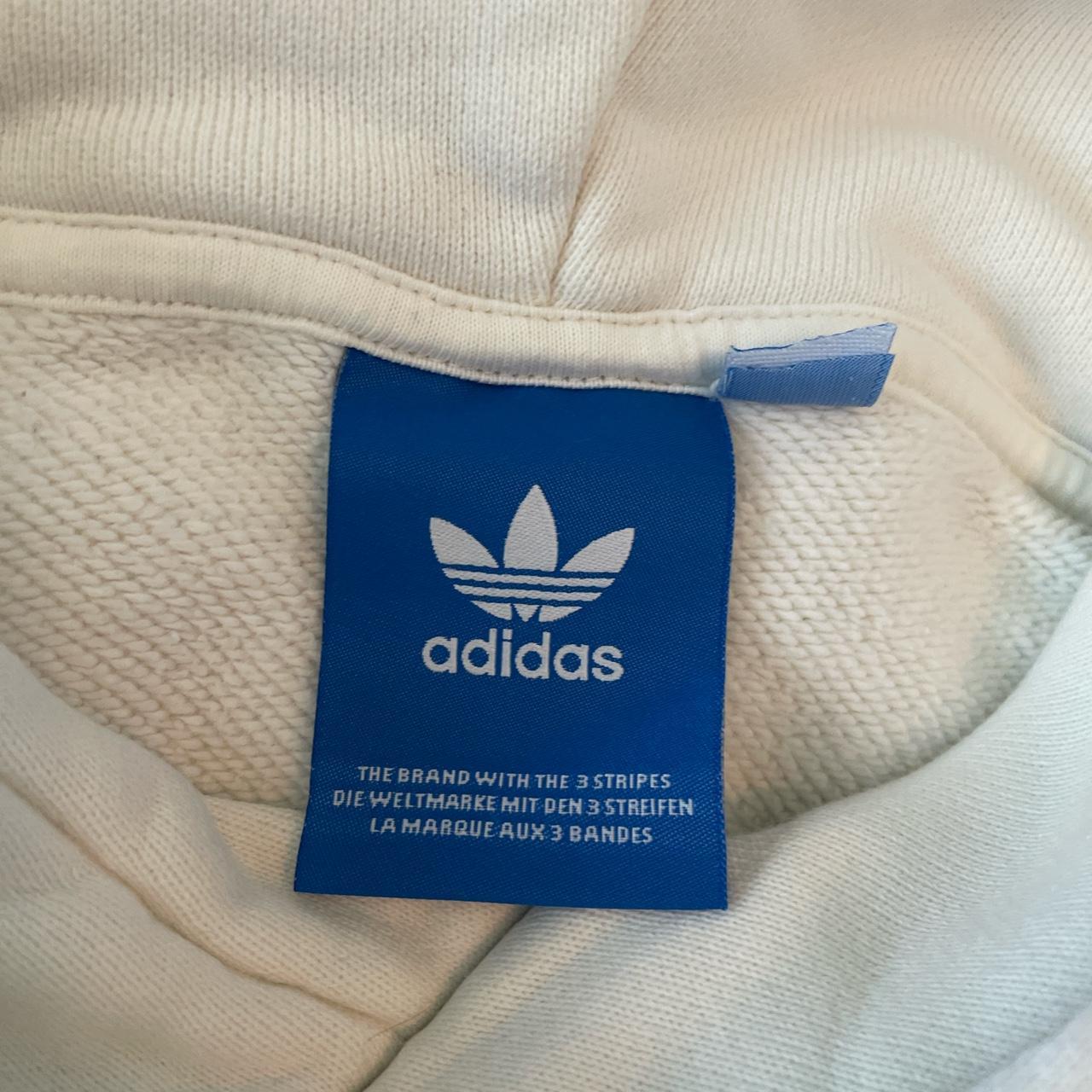 adidas cream hoodie fits like an XL with shorter... Depop
