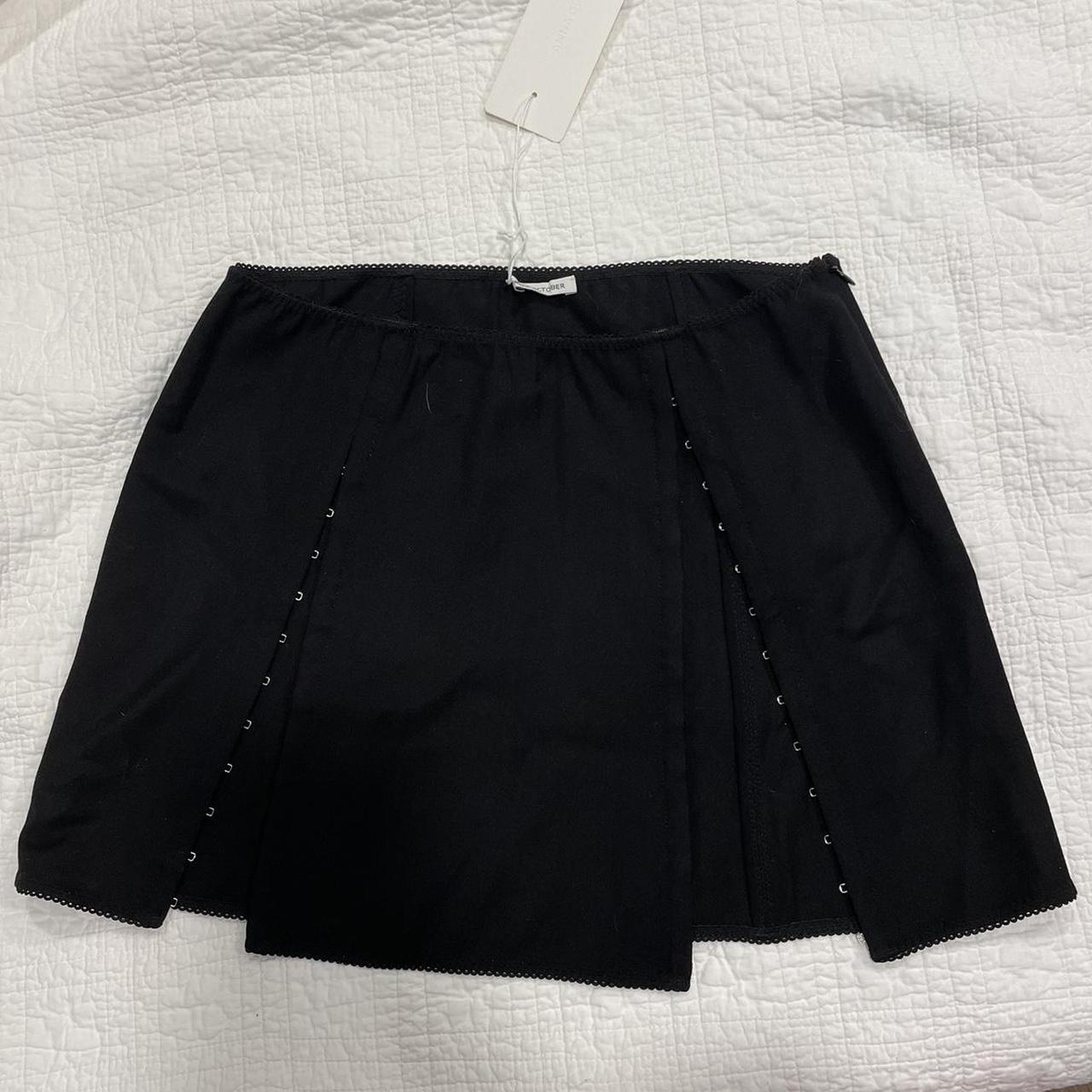 Black Mini Skirt from Anna October Has hook and eye... - Depop